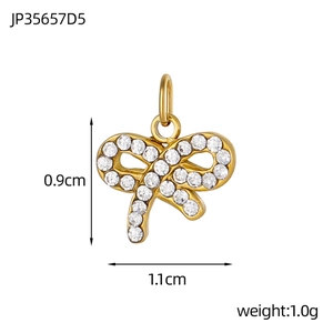 Detailed dimensions of sparkling crystal bow pendant in gold finish measuring 0.9x1.1cm