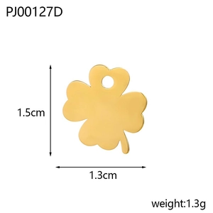 Close-up of a polished gold clover charm pendant showing 1.5cm by 1.3cm dimensions