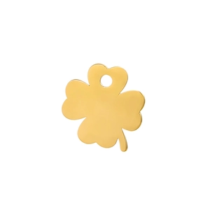 Close-up of a polished gold four-leaf clover charm with a smooth metallic finish