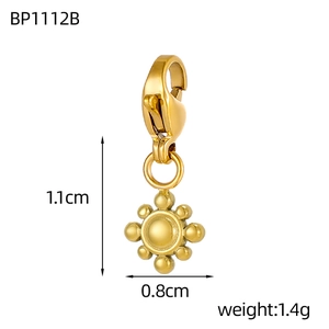 Detailed view of a gold-plated sun charm with dimensions 1.1cm by 0.8cm and lobster clasp