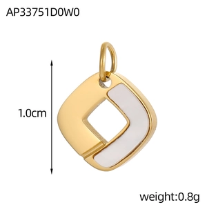 Detail of square titanium steel pendant with white shell inlay and gold plating