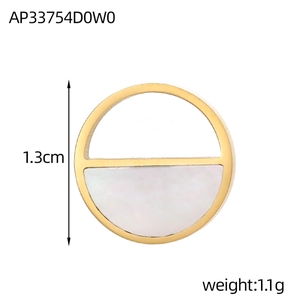 Macro detail of 1.3cm gold plated titanium pendant with white mother of pearl inlay