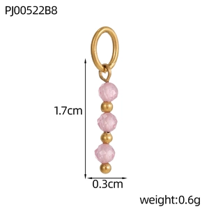Detail view showing a 1.7cm beaded pendant with pink faceted beads and gold spacer rings