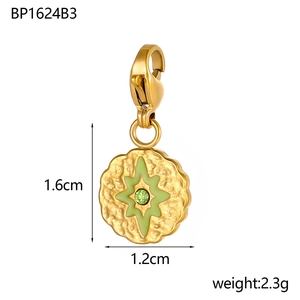 Baroque hammered gold pendant with star pattern and green stone on lobster clasp