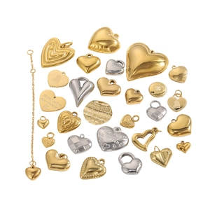 Collection of gold and silver stainless steel heart pendants with textured patterns