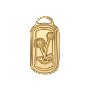 Detail view of a gold rectangular pendant with embossed floral pattern and leaves