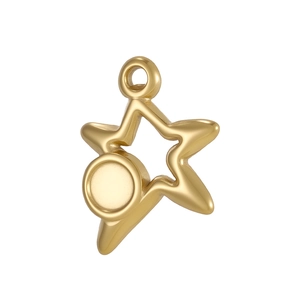 Close-up of star shaped gold pendant with a round setting and brushed metal texture