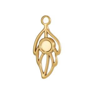 Macro shot of gold plated oval pendant with leaf structure and round setting