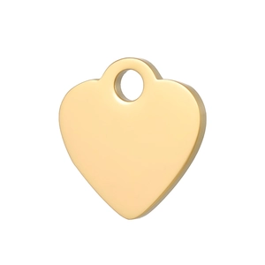 Close-up of heart-shaped gold stainless steel pendant with polished mirror finish