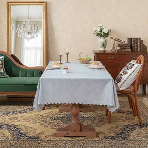 Minimalist light blue rectangular tablecloth with white clover pattern and wavy edges