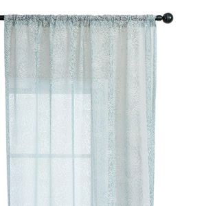 Light blue sheer curtain with white dandelion pattern on a rod for modern living room decor