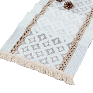 Bohemian hollow out table runner with geometric diamond patterns and tassel trim