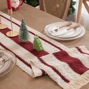 Christmas table runner with red and white stripes, waffle texture and decorative fringe