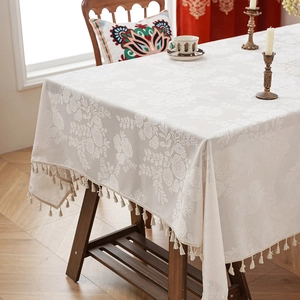 Retro cream rectangle tablecloth with embossed floral patterns and tassels for dining room