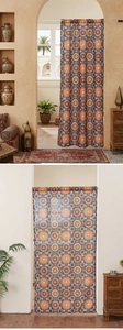 Detail of bohemian mandala curtain with orange patterns in a stylish Mediterranean interior
