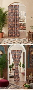 Detail of blue mandala pattern door curtain with rod pocket design in arched doorway