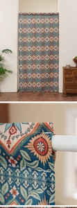 Detailed close-up of bohemian geometric patterns and texture of the ethnic door curtain