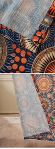 Macro detail of ethnic mandala curtain stitching and textured linen fabric weave