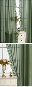 Detail of sage green sheer curtain with ruffle edges and lightweight chiffon texture