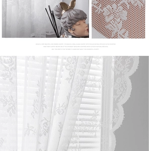 Macro detail of white floral lace curtain fabric with elegant scalloped wavy edges