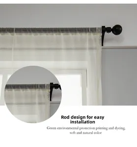 Detail of rod pocket design on semi-transparent white sheer curtain for easy installation