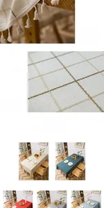 Close-up of waterproof checkered tablecloth fabric with elegant fringe tassel edges