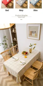 Detail of checkered linen tablecloth with cotton tassel edge in four color options