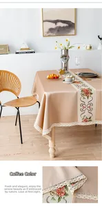 Detail of coffee brown tablecloth with jacquard floral pattern and crochet lace edge