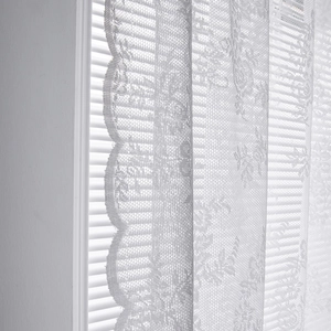 White floral lace sheer curtain with elegant scalloped edges for bedroom windows