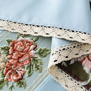 Blue Chinese style fabric tablecloth with red floral embroidery and lace borders