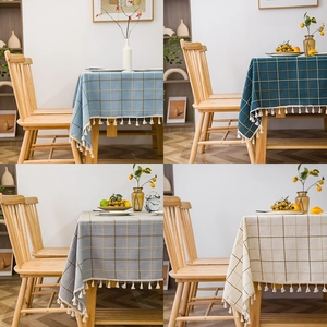 Modern rectangular plaid tablecloth with tassels in blue, gray and beige colors