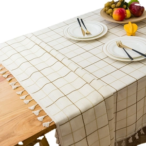 Modern rectangular tablecloth in beige check pattern with tassels for home dining