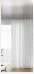 Close-up of white lace sheer curtain with vertical texture for privacy and soft light