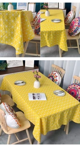 Detailansicht der senfgelben rechteckigen Tischdecke mit weißem geometrischem Rautenmuster