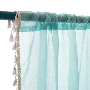 Lightweight mint green sheer curtain with elegant cream tassels and rod pocket design