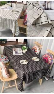 Close-up of black and white checkered cotton linen tablecloth with natural texture