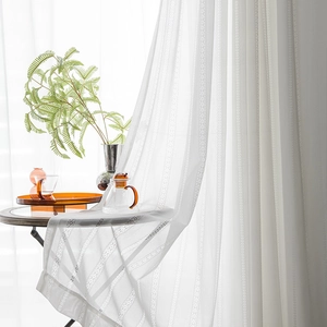 White semi-transparent lace curtain with vertical stripe embroidery for cozy living rooms