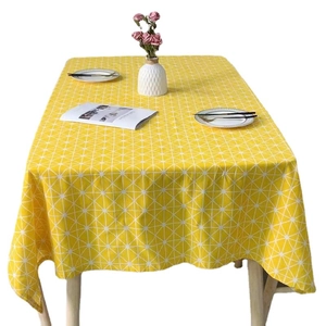 Minimalistische gelbe Tischdecke mit weißem Gittermuster für moderne Esszimmerdekoration
