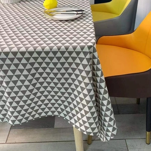 Modern minimalist tablecloth with gray and white geometric triangles for dining room