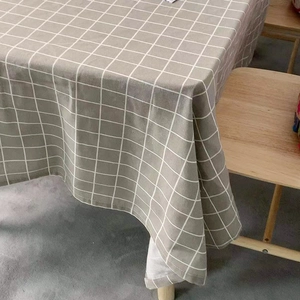 Minimalist grey plaid tablecloth with white grid pattern for a luxury dining room decor