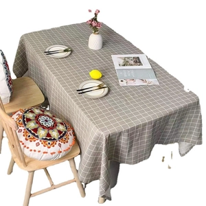 Classic grey and white checkered rectangular tablecloth in a modern home dining setting