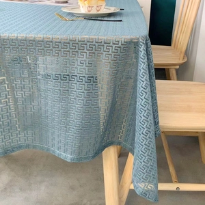 Elegant light blue tablecloth with geometric Greek key pattern for dining room decor
