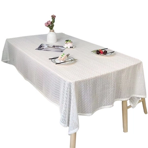 Elegant white rectangular tablecloth with Greek key geometric patterns for dining decor