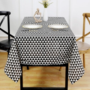 Detail of waterproof PVC tablecloth with black and white geometric triangle patterns