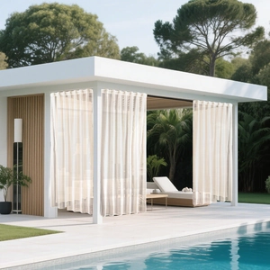 Outdoor semi-transparent cream voile curtain detail for patio gazebo and terrace privacy