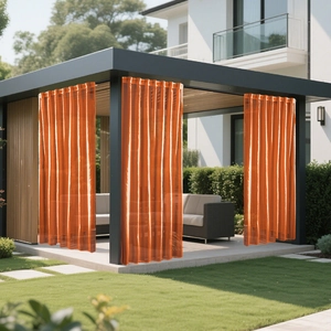 Macro detail of vibrant orange waterproof outdoor sheer curtain on black pergola frame