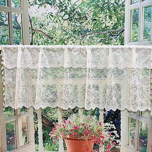 White lace cafe curtain with floral crochet patterns and tassel trim for windows