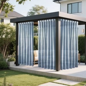 Close-up of light blue waterproof outdoor sheer curtain on a black gazebo rod