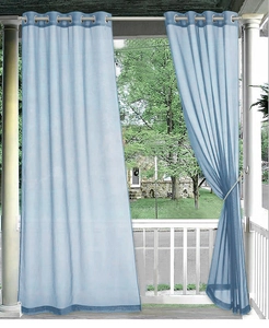 Detail of blue outdoor sheer curtain with silver metal grommets for patio gazebos