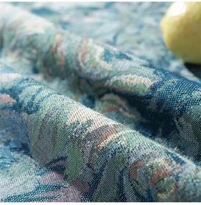 Close-up detail of Bohemian jacquard fabric showing intricate floral weave texture